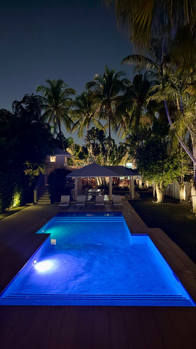 745 NE 77th St, Belle Meade: The resort pool after dark