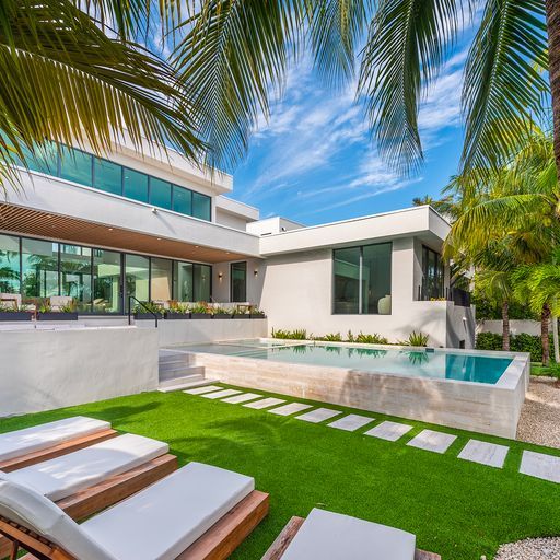 Backyard pool terrace of a modern Miami home
