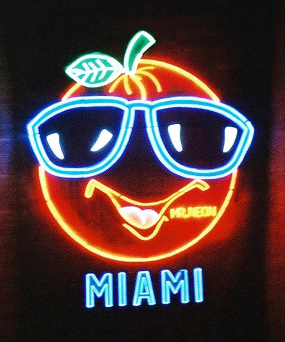 Vintage neon Miami orange sign